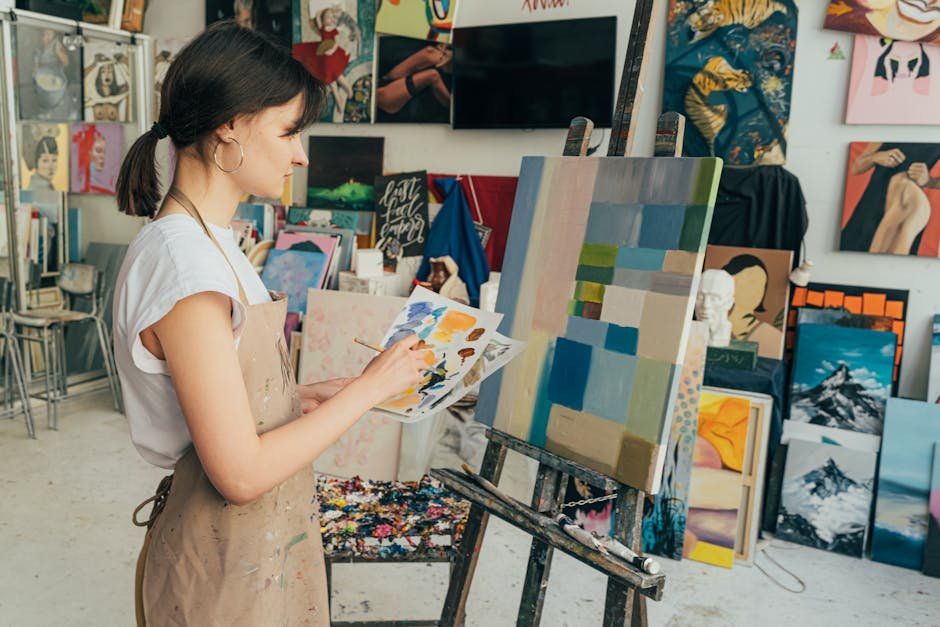 Painter reviewing a modern business website on a tablet at a job site